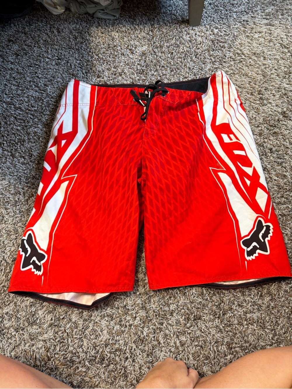 Men’s fox racing red swim trunks. Size 36